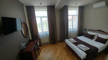 Фото номера Двухместный номер Делюкс с 1 кроватью Отель Hotel Meridian г. Броды 7