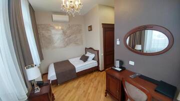 Фото номера Стандартный одноместный номер Отель Hotel Meridian г. Броды 4