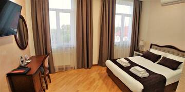 Фото номера Двухместный номер Делюкс с 1 кроватью Отель Hotel Meridian г. Броды 6